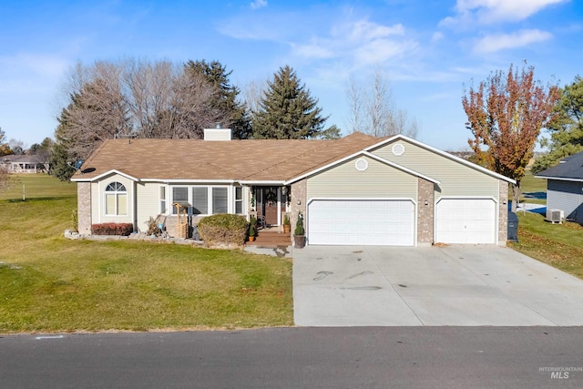 single story home with a front yard and a garage