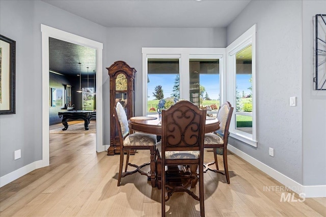 1427 N Morehouse, Eagle, ID 83616 - dining space with light wood-type flooring and baseboards