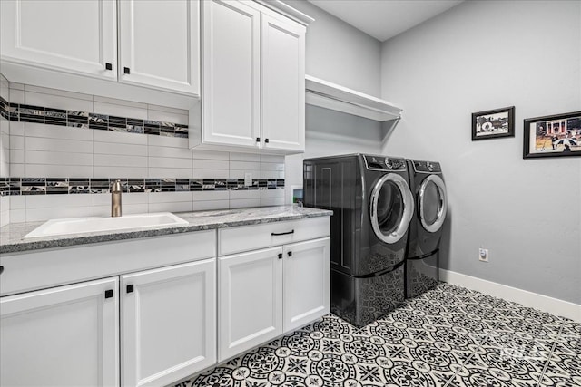 1427 N Morehouse, Eagle, ID 83616 - washroom featuring washing machine and dryer, cabinet space, and baseboards