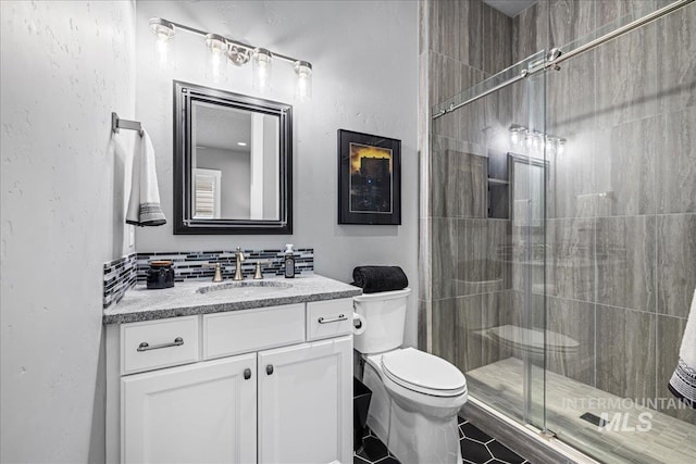 1427 N Morehouse, Eagle, ID 83616 - full bathroom with toilet, vanity, a shower stall, and tile patterned floors