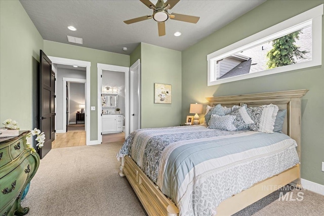 1427 N Morehouse, Eagle, ID 83616 - bedroom with light carpet, recessed lighting, baseboards, connected bathroom, and ceiling fan