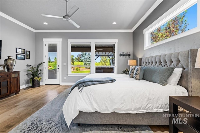 1427 N Morehouse, Eagle, ID 83616 - bedroom featuring ornamental molding, access to exterior, wood finished floors, recessed lighting, and ceiling fan