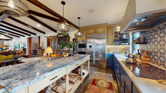 kitchen with pendant lighting, a breakfast bar area, wall chimney exhaust hood, stainless steel appliances, and dark wood-style flooring