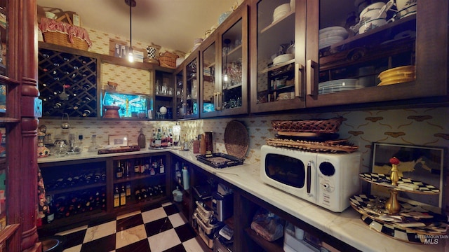 wine room with tile patterned floors