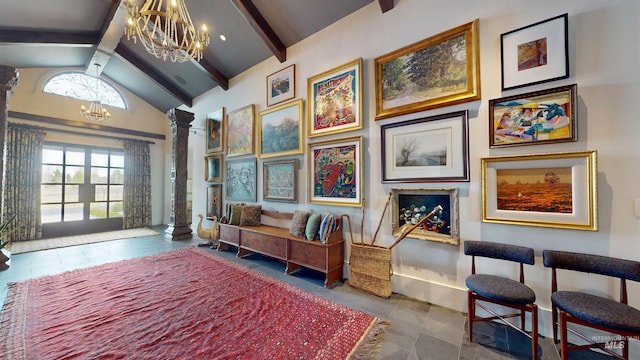 living area with high vaulted ceiling, baseboards, decorative columns, beam ceiling, and a notable chandelier