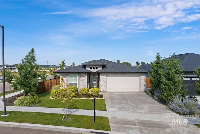 499 S Short Ln, Eagle, ID 83616 - view of front of property featuring a garage, concrete driveway, a shingled roof, and brick siding