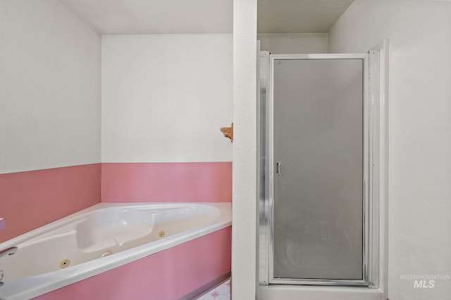 607 S State, Nampa, ID 83686 - bathroom featuring a shower stall and a whirlpool tub