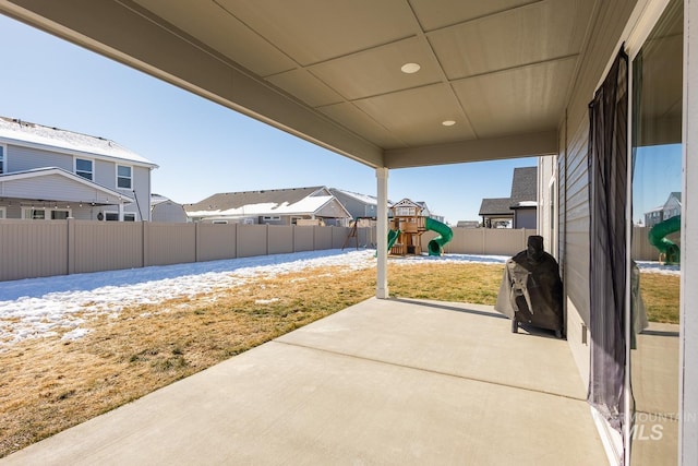 view of patio featuring a playground