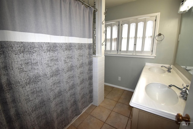 123 15th Ave, Lewiston, ID 83501 - bathroom with tile patterned flooring, double vanity, and curtained shower