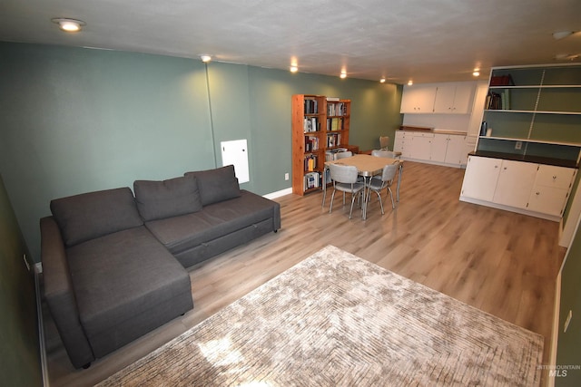 123 15th Ave, Lewiston, ID 83501 - living room with light wood-style floors and baseboards