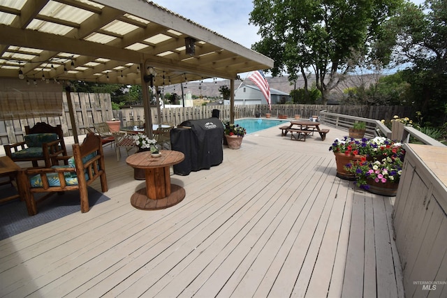 123 15th Ave, Lewiston, ID 83501 - wooden terrace with outdoor dining area, a fenced backyard, area for grilling, and a pergola