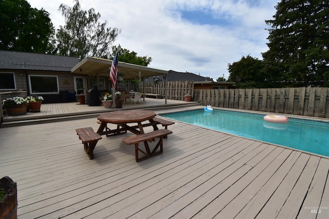 123 15th Ave, Lewiston, ID 83501 - view of swimming pool featuring a fenced backyard and a wooden deck