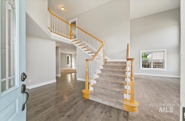 10539 W Merab Ct, Star, ID 83669 - foyer featuring a high ceiling, stairs, and wood finished floors