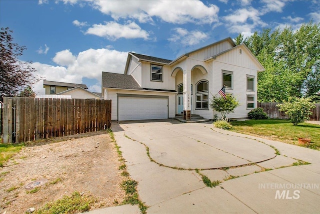 10539 W Merab Ct, Star, ID 83669 - view of front of home featuring board and batten siding, driveway, and a garage
