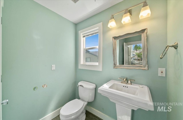 10539 W Merab Ct, Star, ID 83669 - bathroom featuring toilet and baseboards
