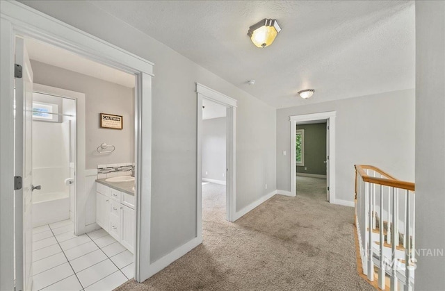 10539 W Merab Ct, Star, ID 83669 - hallway with a textured ceiling and light carpet