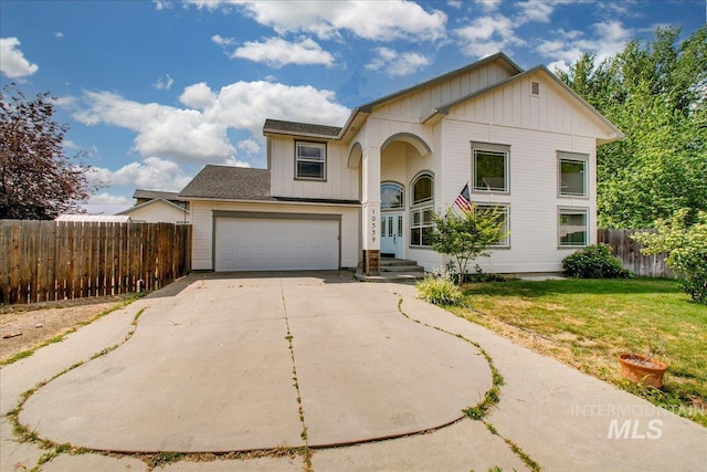 10539 W Merab Ct, Star, ID 83669 - view of front of home with board and batten siding, concrete driveway, and an attached garage