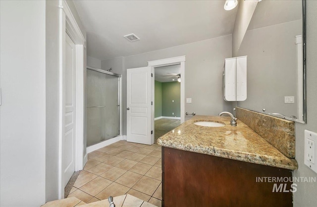 10539 W Merab Ct, Star, ID 83669 - full bathroom featuring vanity, a stall shower, and tile patterned flooring