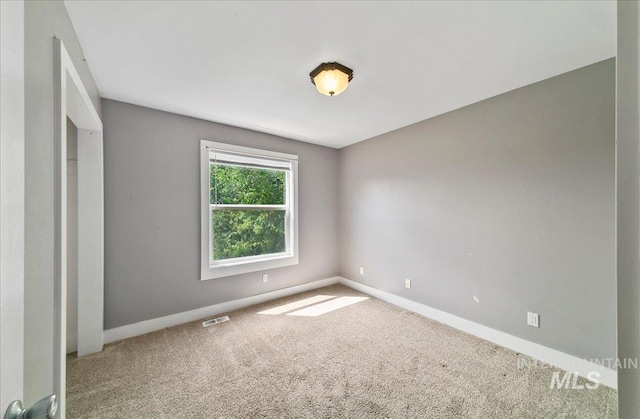 10539 W Merab Ct, Star, ID 83669 - spare room featuring carpet floors and baseboards