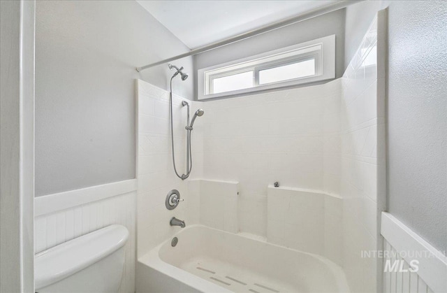 10539 W Merab Ct, Star, ID 83669 - bathroom featuring a wainscoted wall and shower / bathtub combination