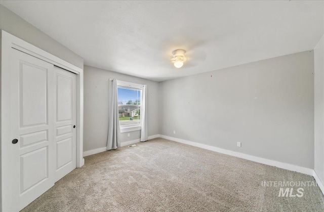 10539 W Merab Ct, Star, ID 83669 - unfurnished bedroom with light carpet and a ceiling fan
