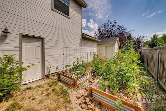 10539 W Merab Ct, Star, ID 83669 - view of yard featuring a vegetable garden