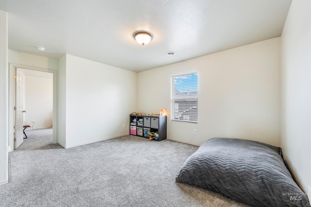 bedroom featuring carpet and visible vents