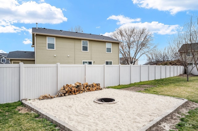 exterior space with a patio, an outdoor fire pit, and a fenced backyard