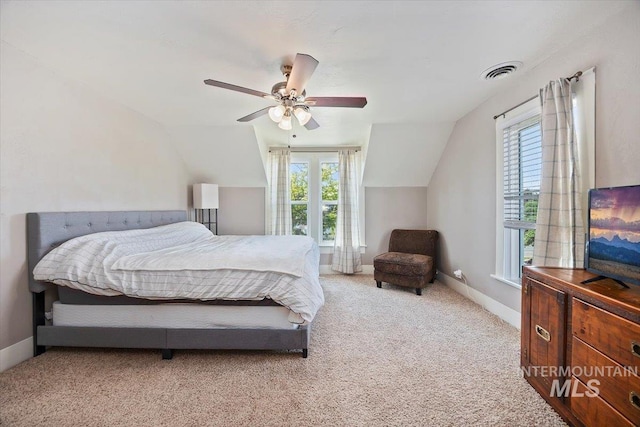 720 E Center St, Kimberly, ID 83341 - carpeted bedroom featuring vaulted ceiling, multiple windows, ceiling fan, and baseboards