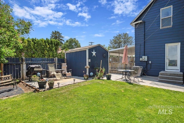 720 E Center St, Kimberly, ID 83341 - view of yard featuring a patio and central air condition unit