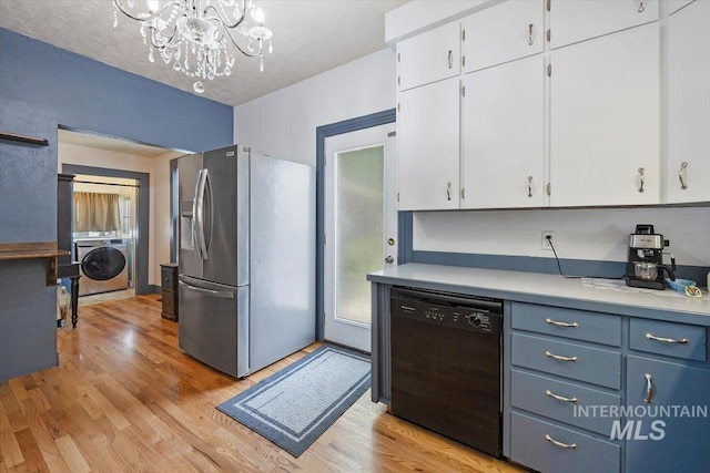 720 E Center St, Kimberly, ID 83341 - kitchen with stainless steel fridge, dishwasher, washer / dryer, light countertops, and white cabinetry
