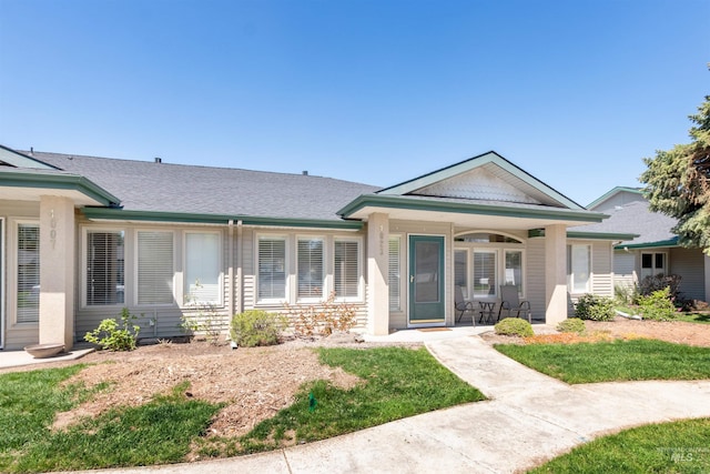 4023 N Bayou Ln, Boise, ID 83703 - view of front of home featuring a porch and a front lawn