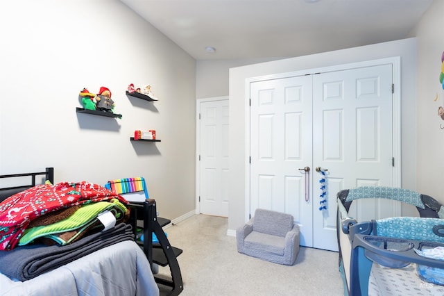 4023 N Bayou Ln, Boise, ID 83703 - bedroom featuring a closet, light carpet, and baseboards