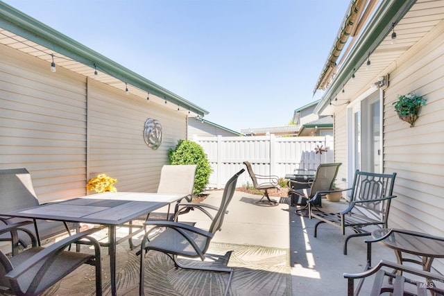 4023 N Bayou Ln, Boise, ID 83703 - view of patio / terrace with outdoor dining space and fence