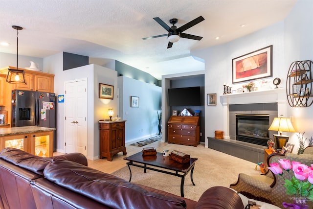 4023 N Bayou Ln, Boise, ID 83703 - living room featuring ceiling fan, a tiled fireplace, and recessed lighting
