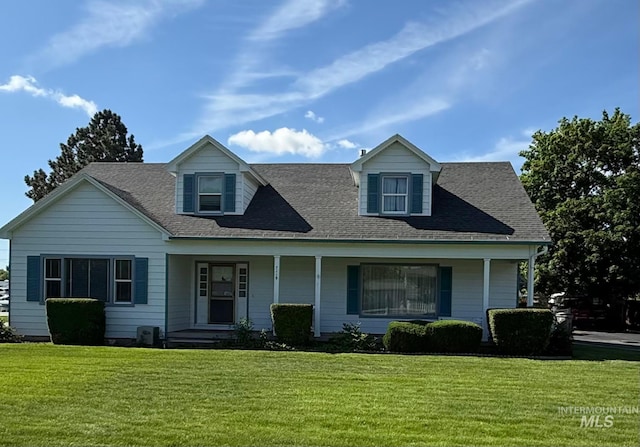7119 W Everett, Boise, ID 83704 - view of front facade featuring a front yard, a porch, and roof with shingles