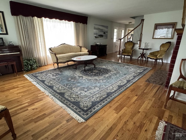 7119 W Everett, Boise, ID 83704 - living area featuring wood finished floors and stairway