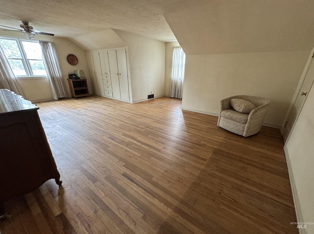 7119 W Everett, Boise, ID 83704 - bonus room with lofted ceiling, light wood-type flooring, baseboards, a ceiling fan, and a textured ceiling