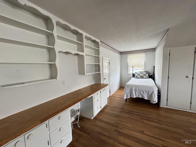 7119 W Everett, Boise, ID 83704 - bedroom with dark wood finished floors and a textured ceiling
