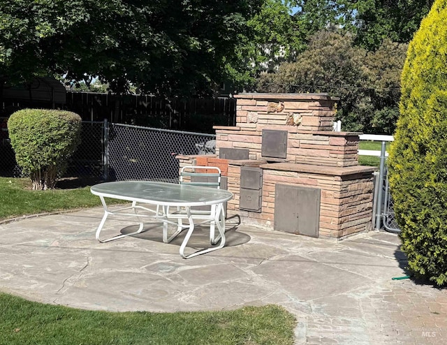 7119 W Everett, Boise, ID 83704 - view of patio / terrace featuring fence