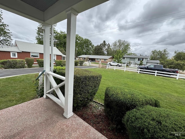 7119 W Everett, Boise, ID 83704 - view of green lawn featuring a porch