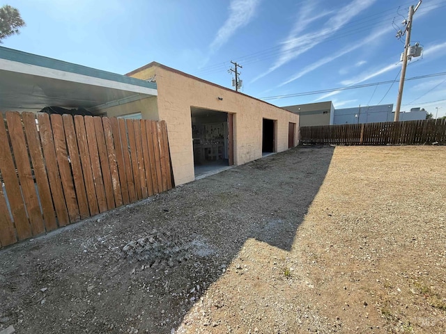 7119 W Everett, Boise, ID 83704 - view of home's exterior with fence and stucco siding