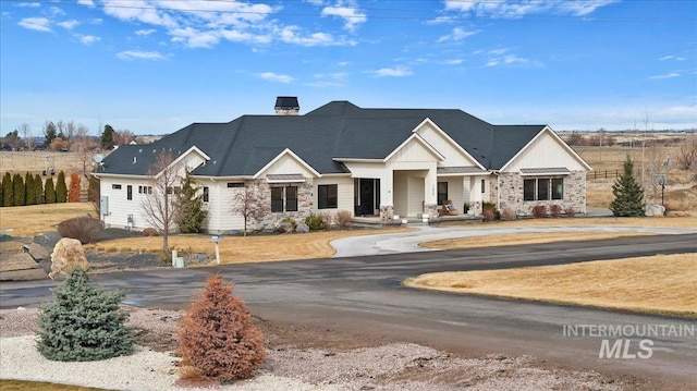 view of front of house featuring stone siding