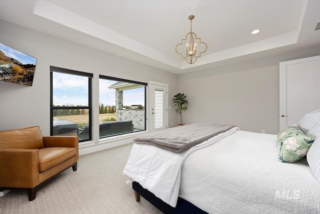 bedroom featuring visible vents, a notable chandelier, recessed lighting, a raised ceiling, and light colored carpet