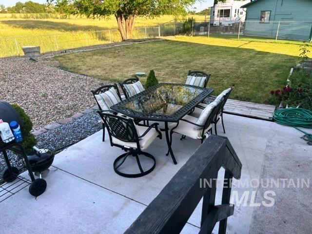 view of patio / terrace with outdoor dining area and a fenced backyard