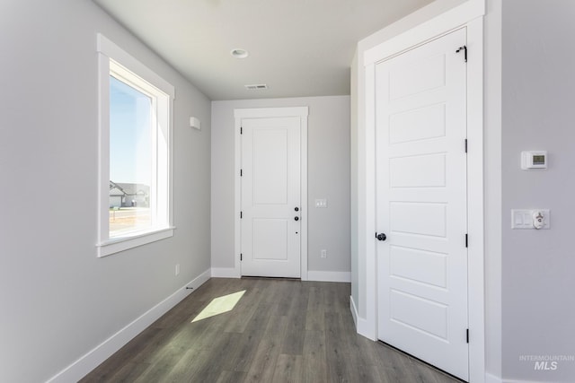 hall featuring dark hardwood / wood-style floors