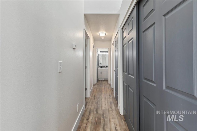 hall featuring light wood-type flooring