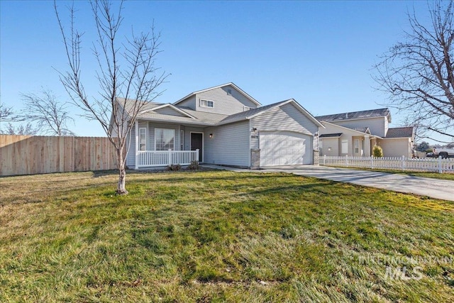 view of front of house with a porch, a front yard, and a garage