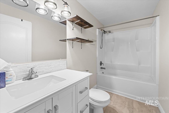 full bathroom with tasteful backsplash, bathtub / shower combination, tile patterned flooring, vanity, and toilet