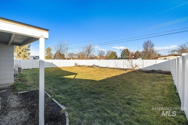 view of yard with central AC